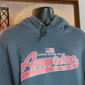 America 3d raised lettering nwot. XL in steel blue. NWOT